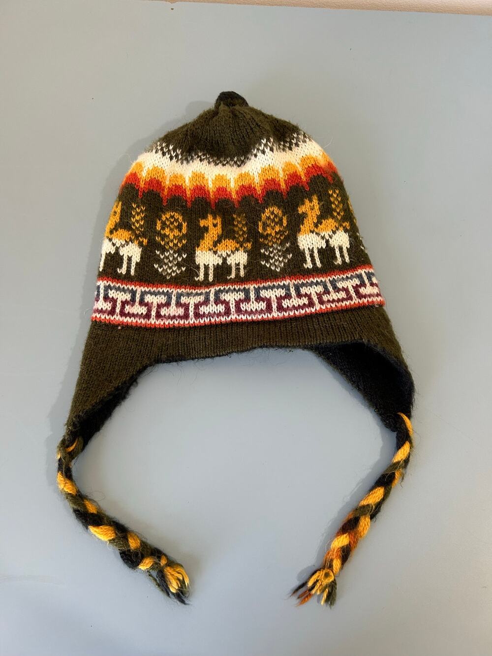 Peruvian Winter hat reversible ear flaps llama/alpaca print green black yellow